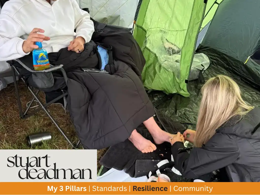 Stuart Deadman having his feet tended to at the SBYU